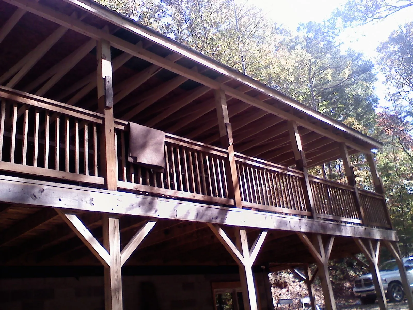 Timber framing under a new elevated porch and deck — Roof Leak Repair in Fair Play by Roofing Brothers